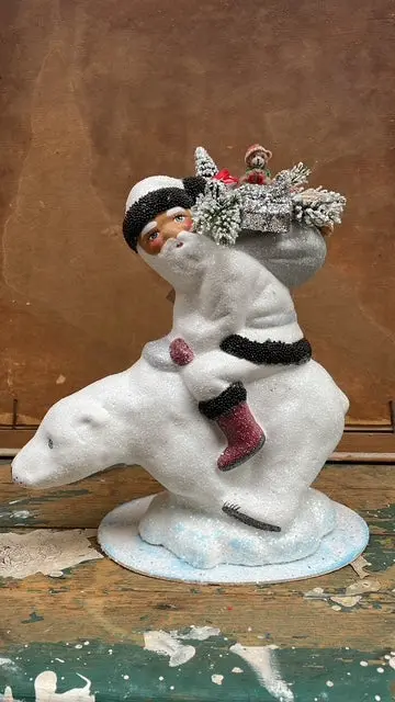 White Glitter Santa With Black Beaded Trim & Bag Of Toys On Polar Bear | Ino Schaller 1